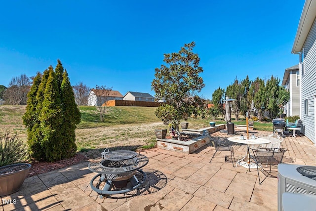 view of patio / terrace with outdoor dining area and cooling unit