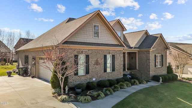 view of property exterior featuring a garage, concrete driveway, brick siding, and a yard