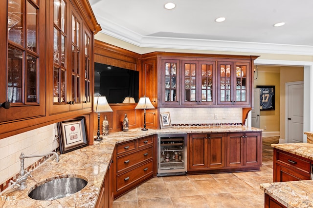 bar featuring crown molding, wine cooler, tasteful backsplash, and a sink