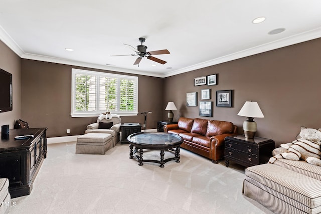 living room with ceiling fan, recessed lighting, light colored carpet, baseboards, and ornamental molding