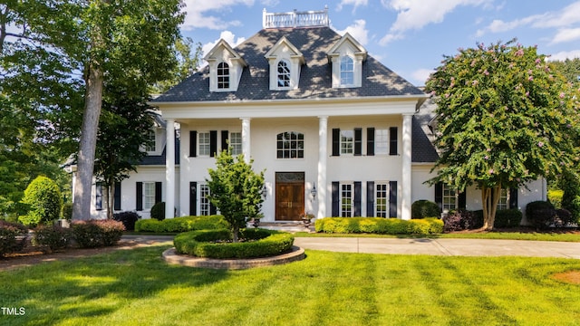 view of front of house with a front lawn