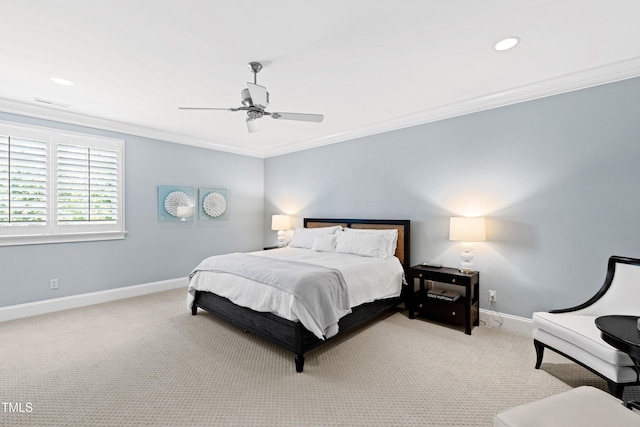 bedroom featuring carpet, baseboards, ornamental molding, and ceiling fan