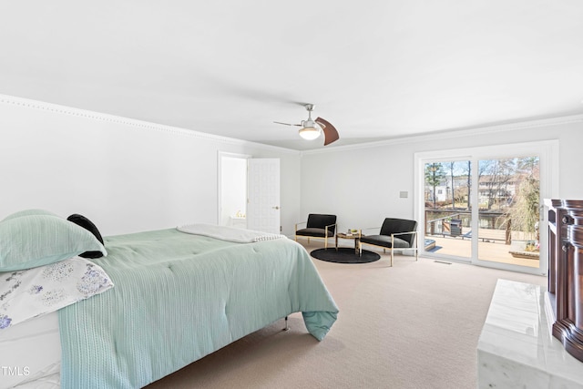 bedroom featuring access to outside, crown molding, a ceiling fan, and carpet flooring