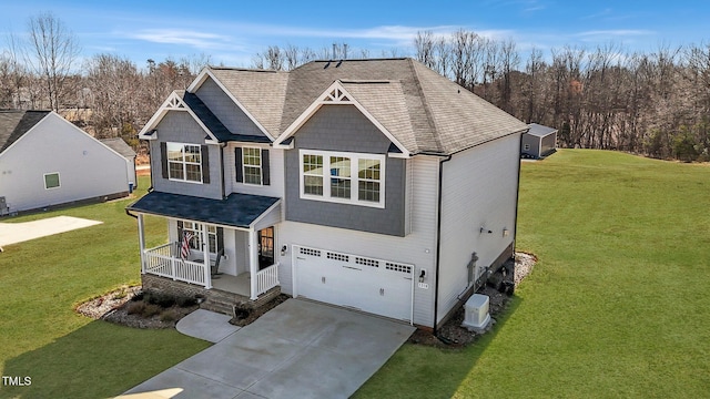 1318 Reading Ct, Burlington, NC 27217 - view of front of house with an attached garage, driveway, a front yard, and covered porch