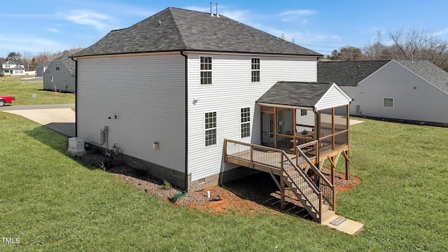 1318 Reading Ct, Burlington, NC 27217 - back of property featuring roof with shingles, a sunroom, a yard, and stairs