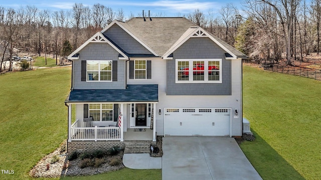 1318 Reading Ct, Burlington, NC 27217 - craftsman inspired home with concrete driveway, a porch, a front yard, and a garage