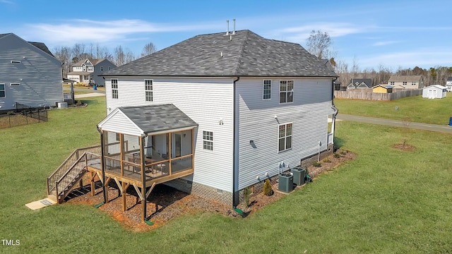 1318 Reading Ct, Burlington, NC 27217 - rear view of house featuring a wooden deck, a yard, central AC, and a shingled roof