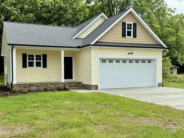 512 Hicksmill Rd, Oxford, NC 27565 - view of front of house with concrete driveway, an attached garage, a shingled roof, and a front lawn