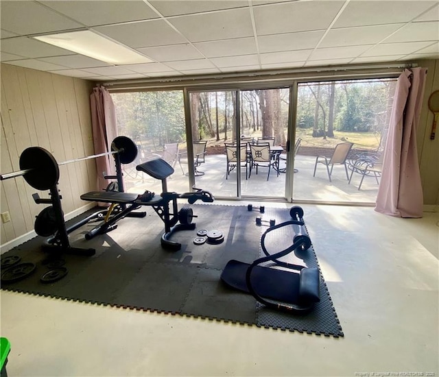 1855 Riverside Blvd, Lumberton, NC 28358 - exercise area with healthy amount of natural light, a drop ceiling, and wooden walls