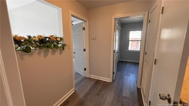 1809 Wayne Ln, Fayetteville, NC 28304 - corridor with baseboards and dark wood-style flooring