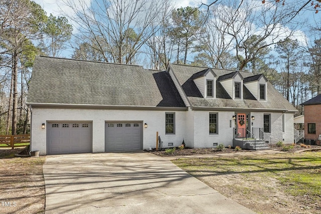 cape cod house featuring a garage, brick siding, fence, driveway, and crawl space