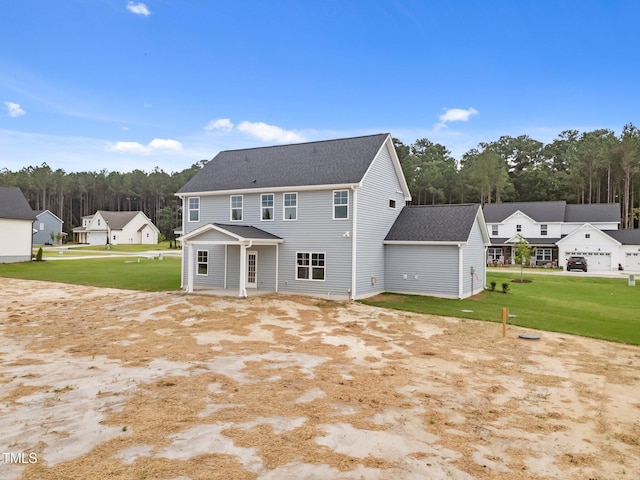 432 E Clydes Point Way, Wendell, NC 27591 - rear view of property featuring a residential view, a yard, and roof with shingles