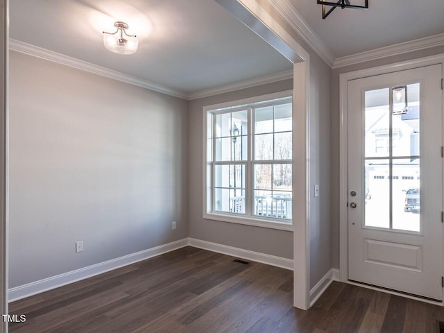 doorway to outside with baseboards, dark wood finished floors, visible vents, and crown molding