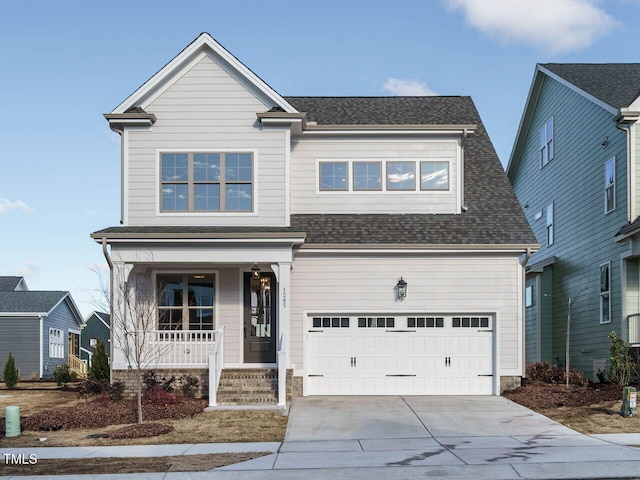 1245 Barreto Dr, Wendell, NC 27591 - traditional home featuring driveway, a shingled roof, and a porch