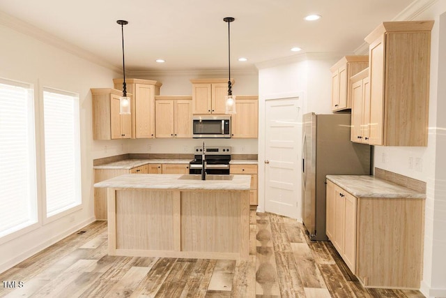 kitchen with a center island with sink, stainless steel appliances, crown molding, light countertops, and light brown cabinets