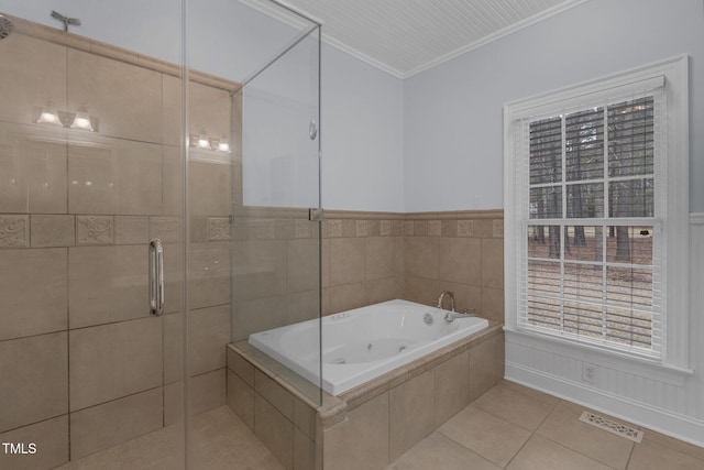 bathroom with visible vents, ornamental molding, a stall shower, a jetted tub, and tile patterned floors