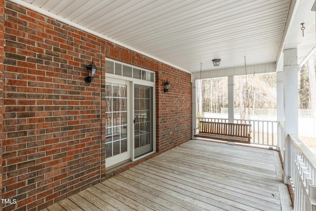 deck with covered porch