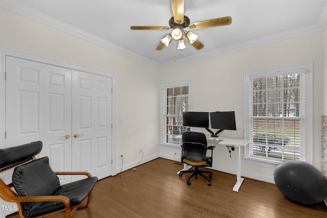 office space featuring crown molding, baseboards, and wood finished floors