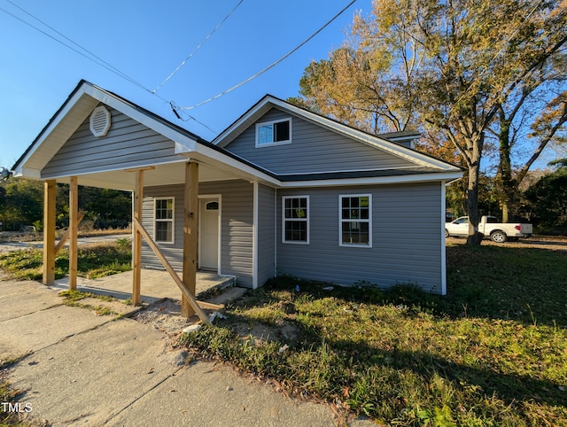 bungalow-style house featuring covered porch