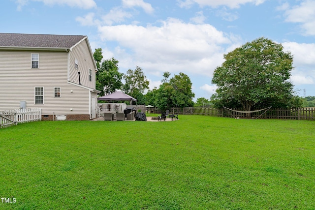 533 E Maple Ave, Holly Springs, NC 27540 - fenced backyard with an outdoor hangout area