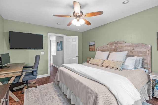 533 E Maple Ave, Holly Springs, NC 27540 - bedroom with wood finished floors, an office area, and ceiling fan