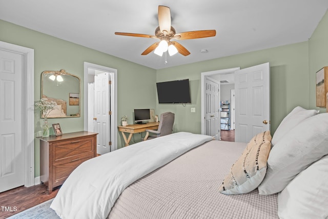 533 E Maple Ave, Holly Springs, NC 27540 - bedroom featuring dark wood-style floors and a ceiling fan