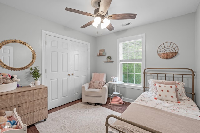 533 E Maple Ave, Holly Springs, NC 27540 - bedroom with wood finished floors, a closet, and ceiling fan