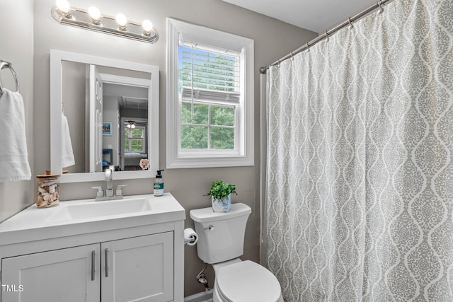 533 E Maple Ave, Holly Springs, NC 27540 - bathroom with vanity and curtained shower