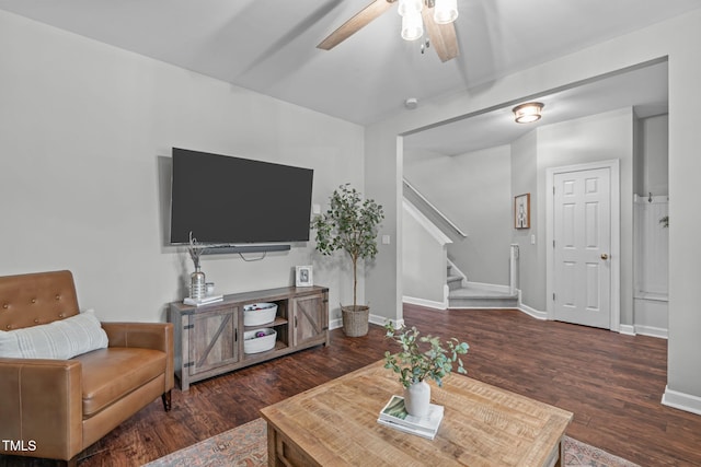 533 E Maple Ave, Holly Springs, NC 27540 - living area with ceiling fan, stairs, and wood finished floors