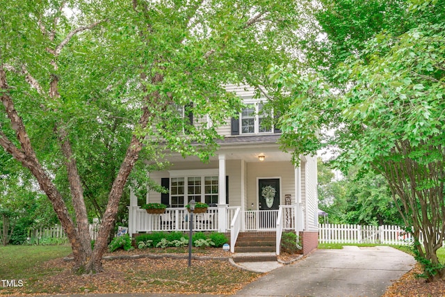 533 E Maple Ave, Holly Springs, NC 27540 - view of front of home featuring covered porch