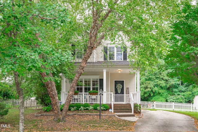 533 E Maple Ave, Holly Springs, NC 27540 - view of front of home with a porch