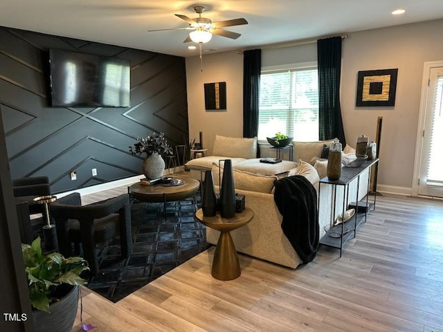 living room with ceiling fan, baseboards, wood finished floors, and recessed lighting