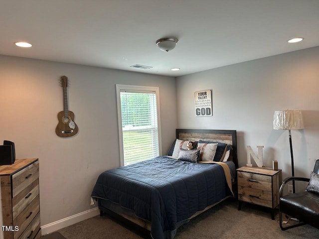 carpeted bedroom with recessed lighting, visible vents, and baseboards