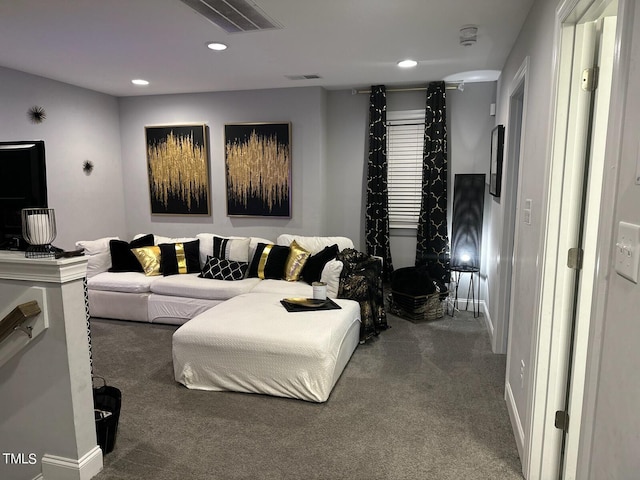 living area with carpet, visible vents, baseboards, and recessed lighting