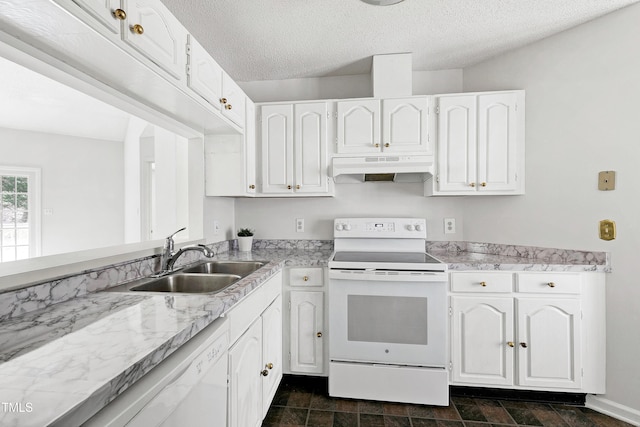 kitchen with light countertops, white cabinets, a sink, white appliances, and under cabinet range hood