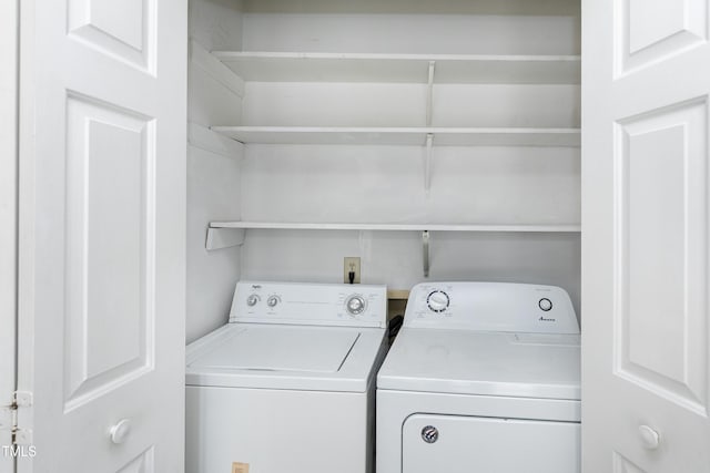 laundry area featuring laundry area and independent washer and dryer