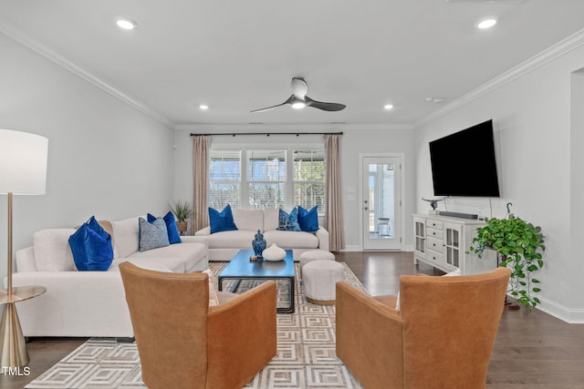 living area with recessed lighting, baseboards, crown molding, and wood finished floors