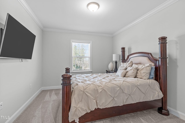 bedroom with carpet, crown molding, and baseboards