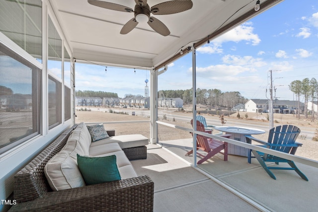 view of patio featuring ceiling fan and outdoor lounge area