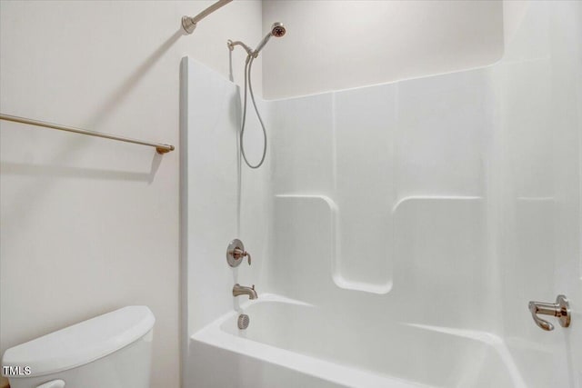 full bath featuring shower / bath combination and toilet