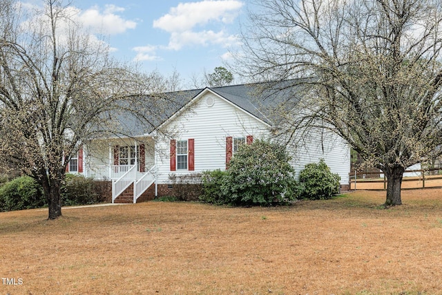 single story home featuring a front lawn, crawl space, and a porch