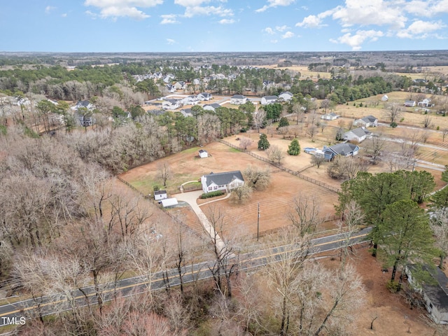 birds eye view of property featuring a rural view