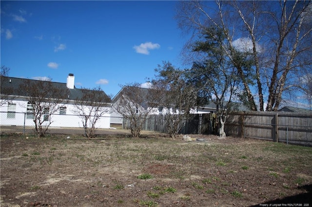 view of yard with fence