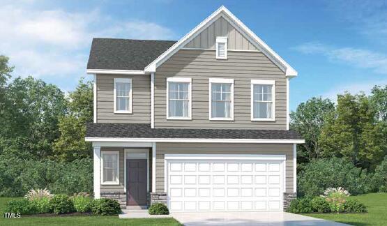 view of front of house featuring board and batten siding, concrete driveway, and an attached garage