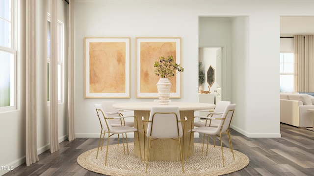 dining room with dark wood-type flooring and baseboards