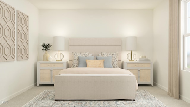 bedroom featuring baseboards and light colored carpet