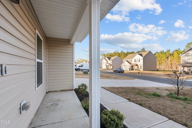 view of patio with a residential view