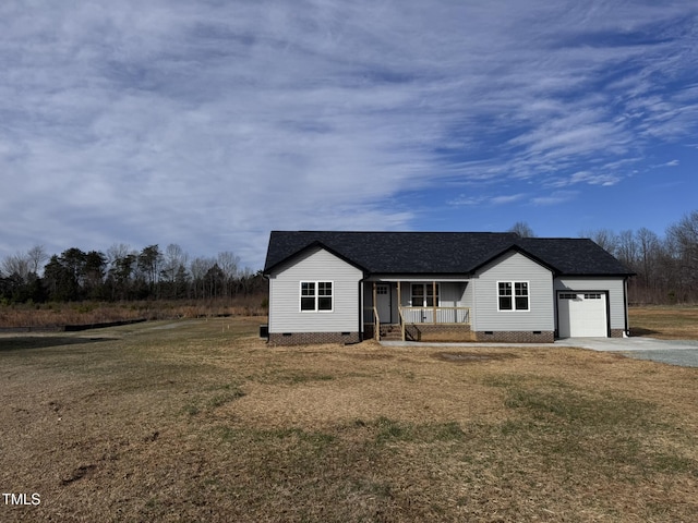 ranch-style home with a porch, an attached garage, crawl space, driveway, and a front lawn