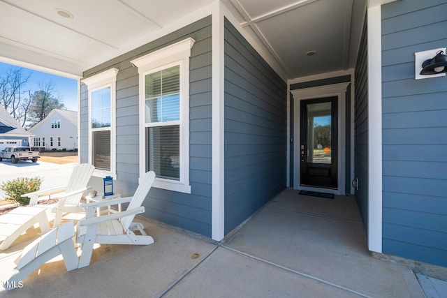 entrance to property with covered porch