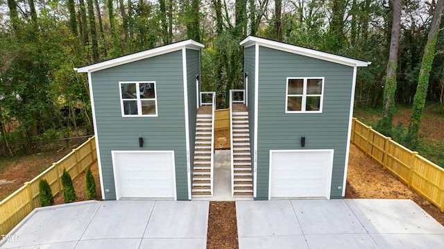 exterior space with fence and stairway